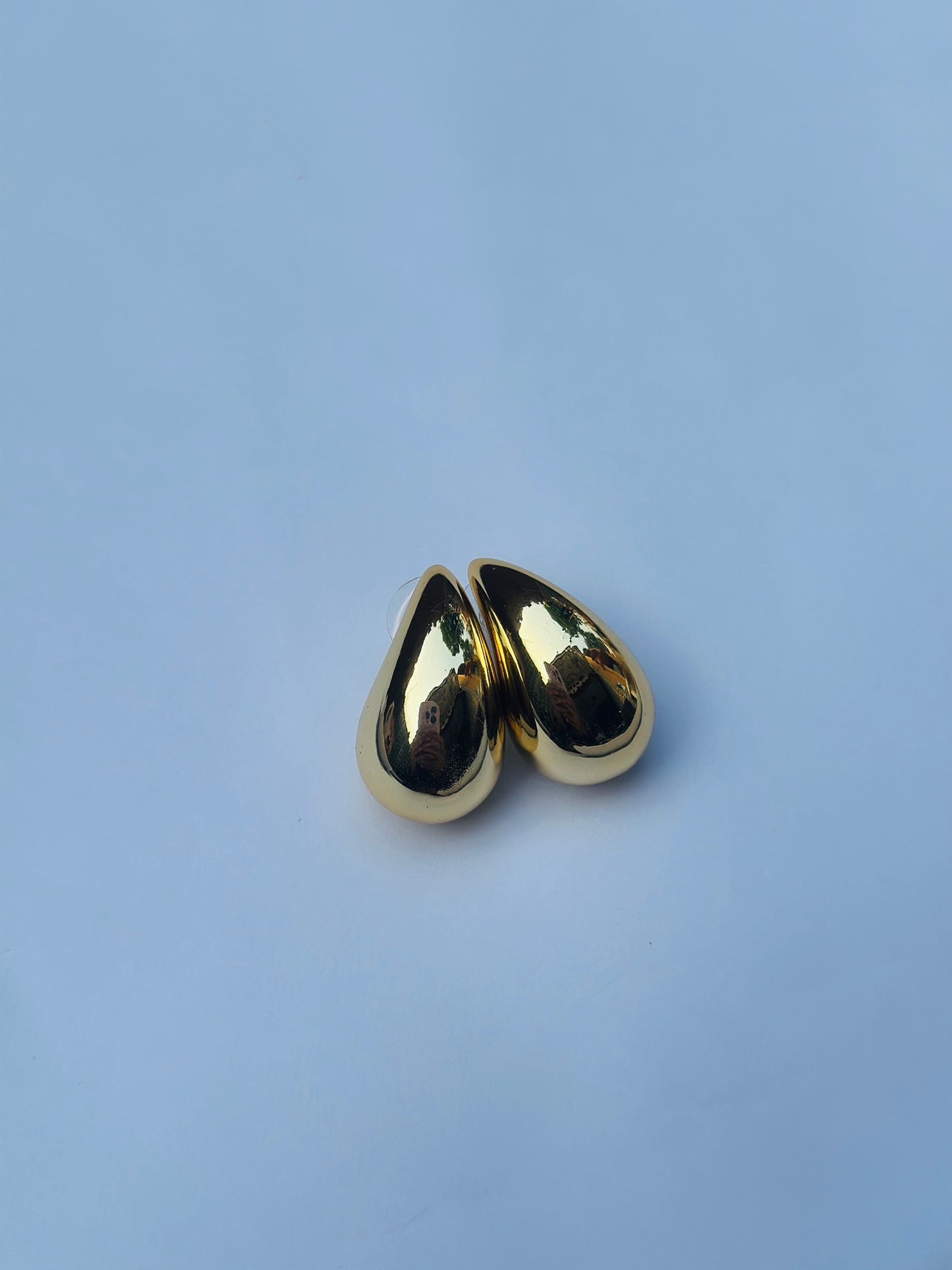 Molten Curve Statement Earrings