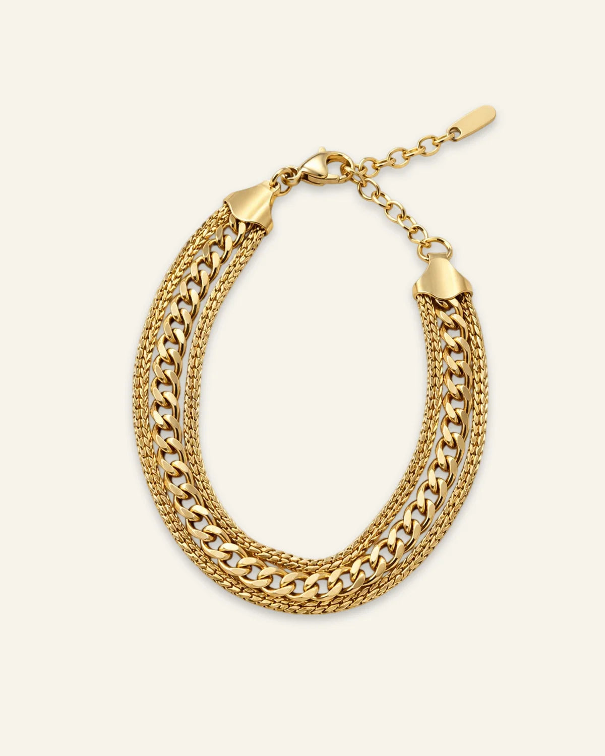 Golden Trinity Chain Bracelet, a multi-strand layered gold-tone chain bracelet featuring mixed link styles and an adjustable clasp extension, displayed on a clean neutral background.